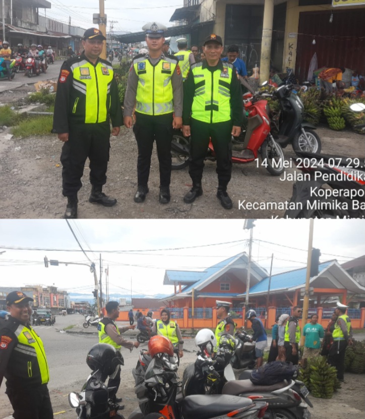 Senkom bersama Satlantas Polres Mimika Bantu Strong Point